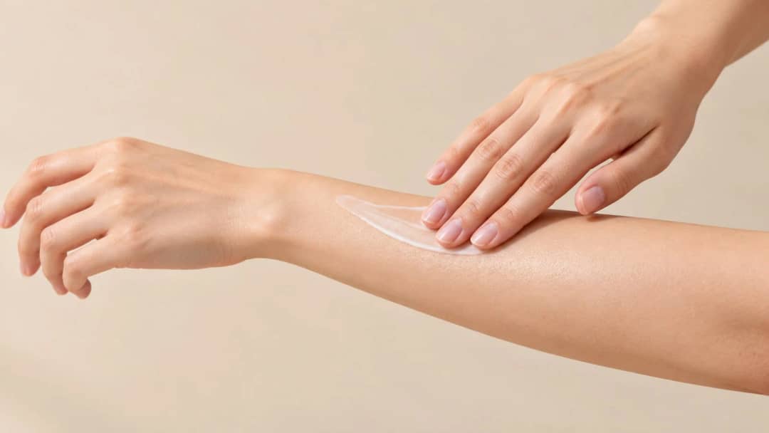 Moisturizer texture applied to the forearm, showing a lightweight, non-greasy finish